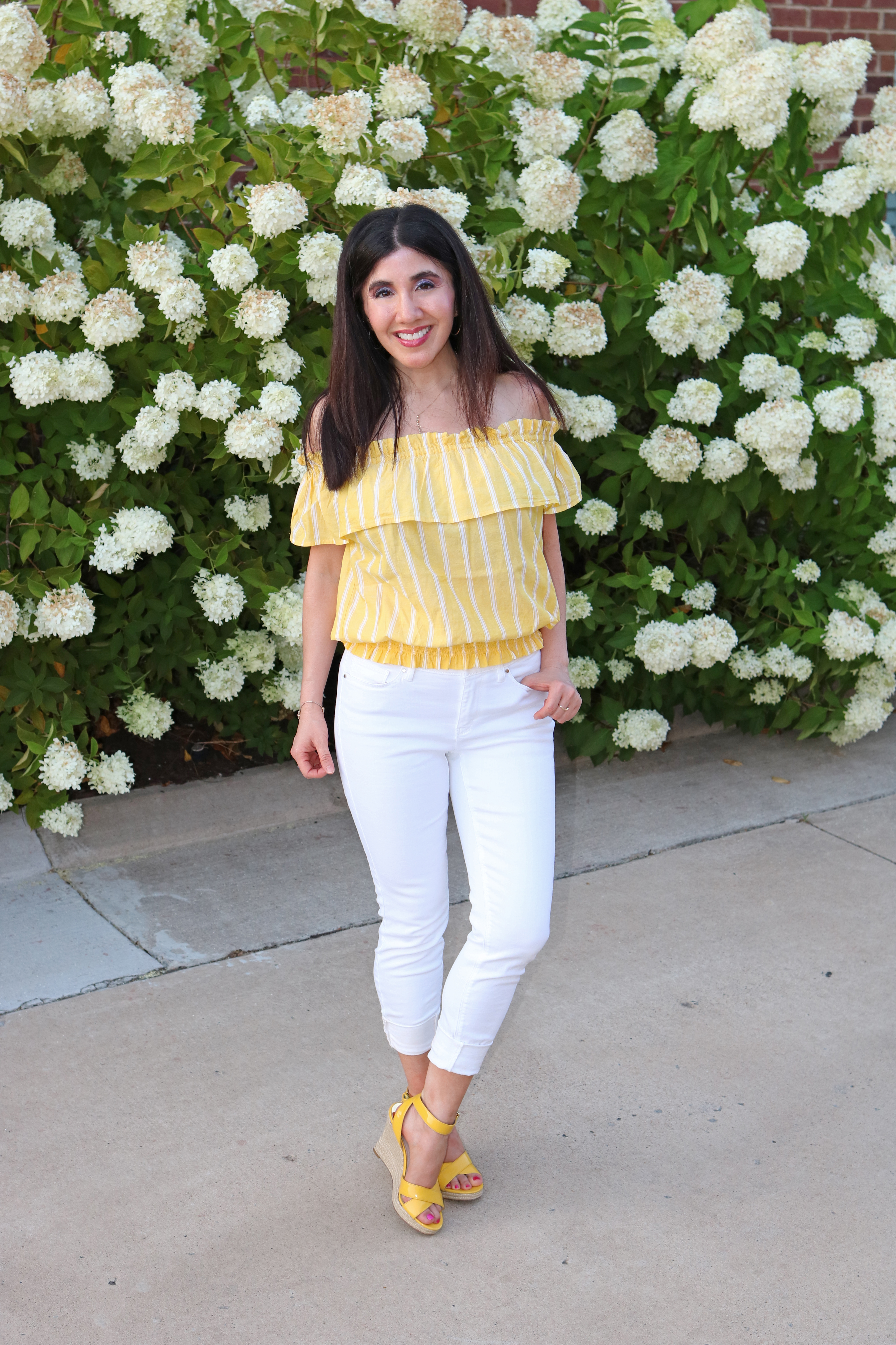 yellow top and white jeans